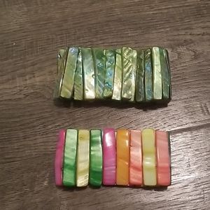 Colored stretchy bracelets.